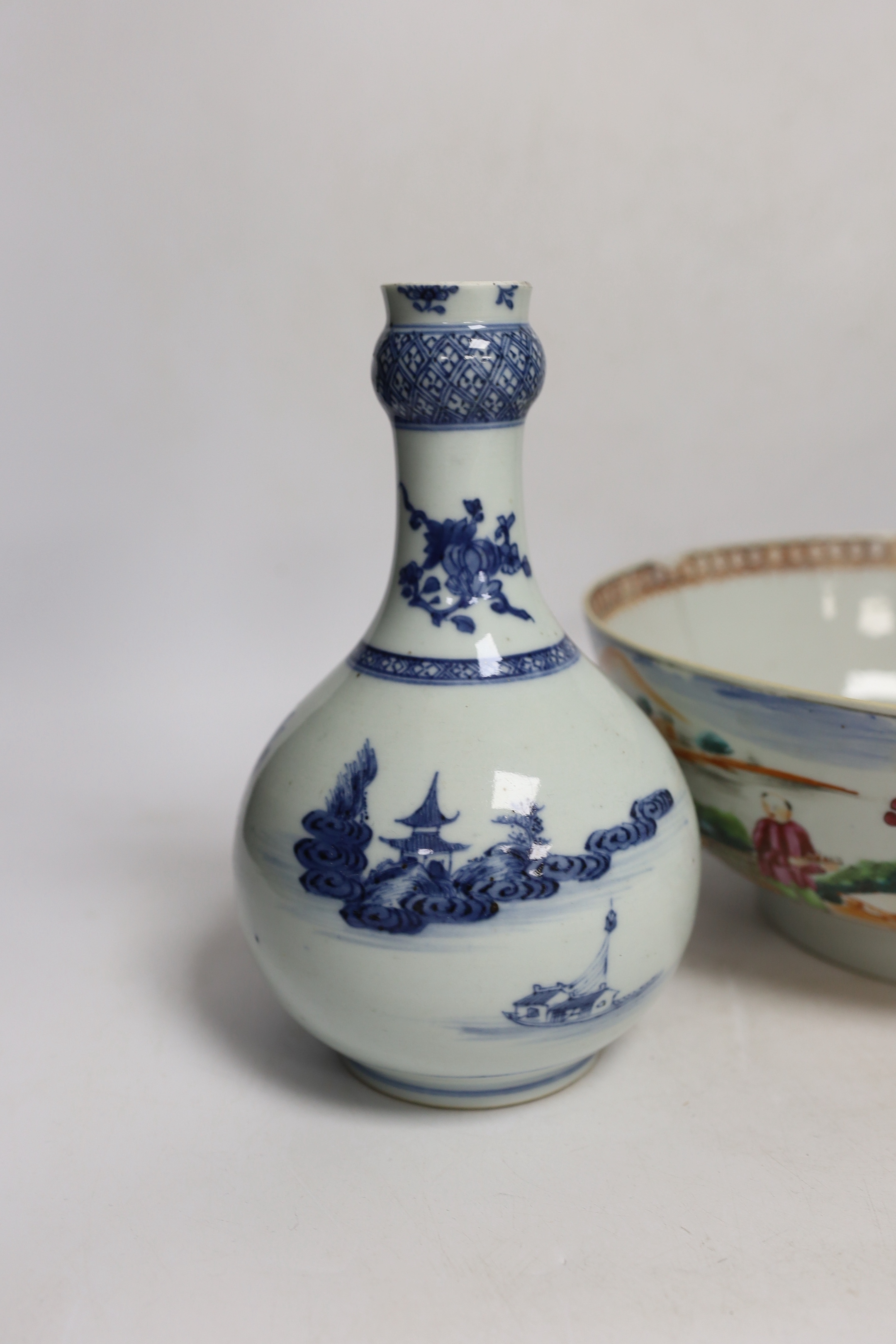 A Chinese Qianlong blue and white garlic neck vase and a famille rose bowl, 18th century largest 26cm in diameter